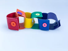Load image into Gallery viewer, vinyl button chain links fine motor skill activity