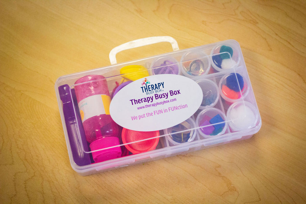Children's Therapy Busy Box closed and showing logo on outside of box