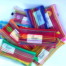 Load image into Gallery viewer, stack of fine motor skill button activities in zippered pouches
